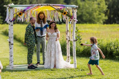 The best wedding photography capturing the joyful union of a bride and groom in a picturesque field.