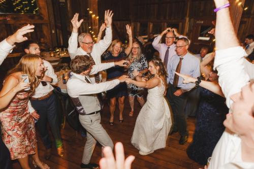 A group of people dancing at a Western MA wedding reception.
