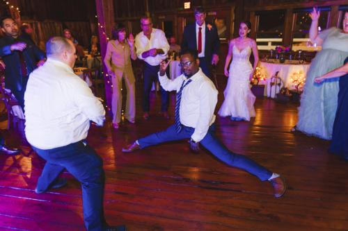 A man is dancing on the dance floor at a Western MA wedding.